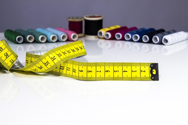 Roll of white PTFE thread seal tape 12mm width for plumbing pipe thread sealing on white background